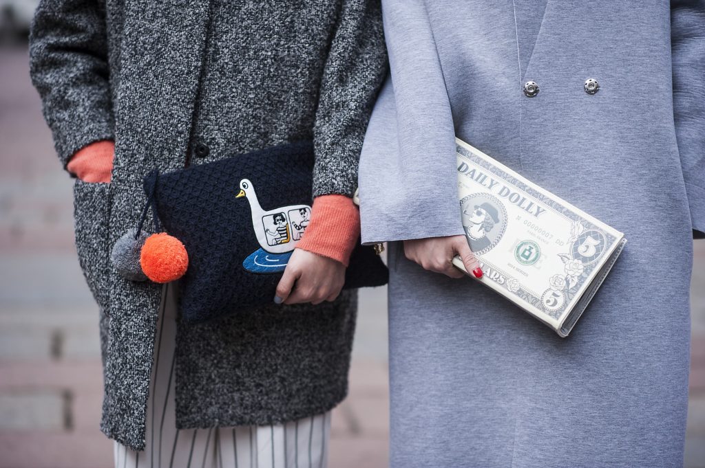 Street fashion in Milan outside the AW15 shoes. Image by GoRunway