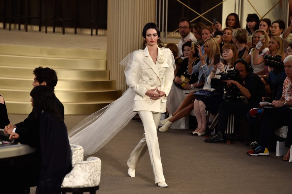 Kendall Jenner was the showstopper at the Chanel Couture runway as a tomboy bride in sharp 80s era tailored pantsuit