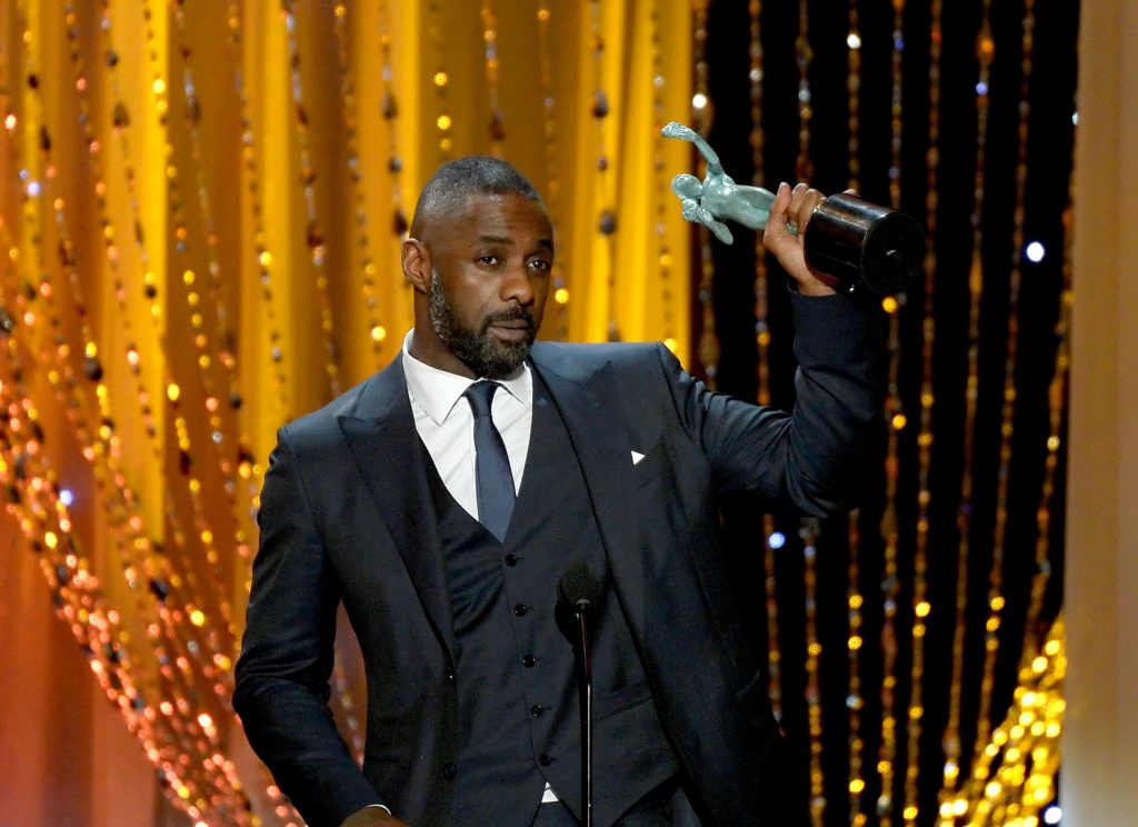 Actor Idris Elba accepts the Outstanding Performance by a Male Actor in a Supporting Role award for 'Beasts of No Nation'