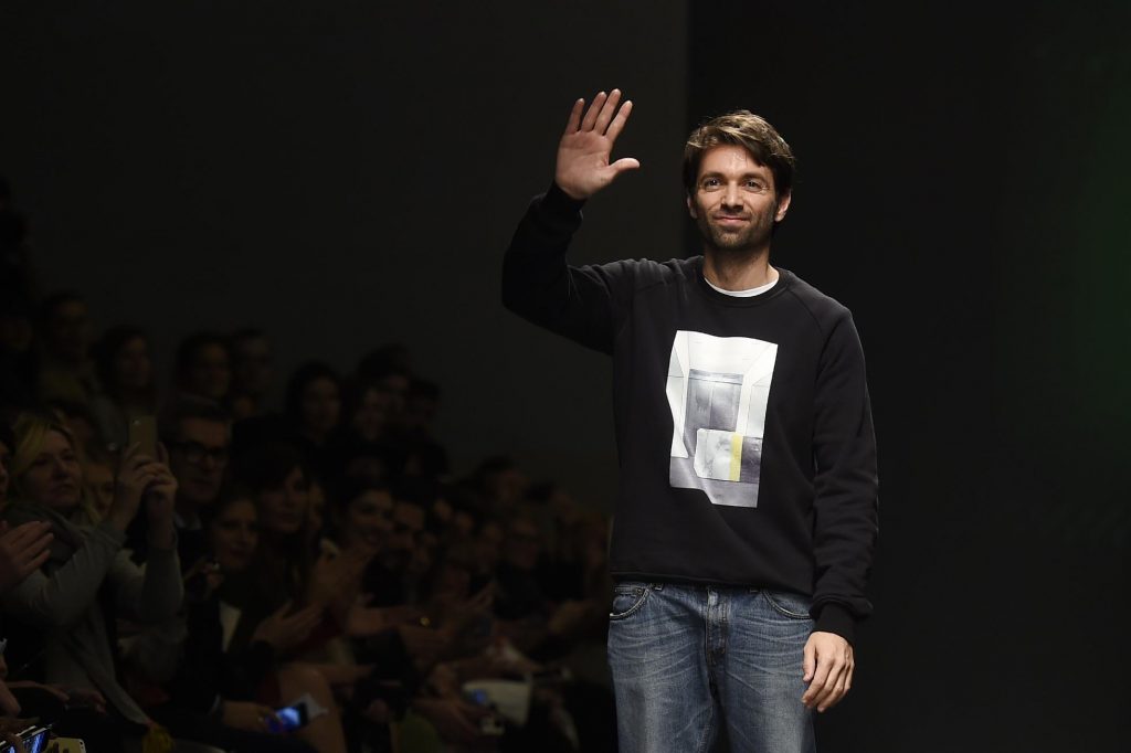 Massimo Giorgetti waves at Emilio Pucci's spring/summer 16 show in Milan