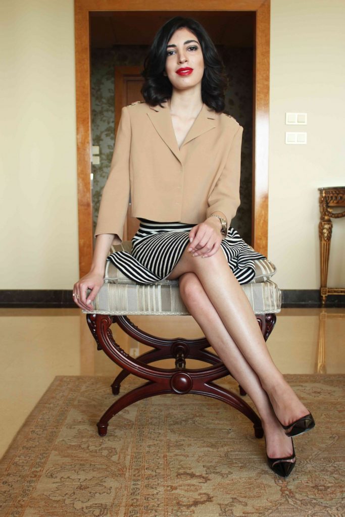 Tracy wears Elisabetta Franchi jacket and skirt with Christian Dior shoes