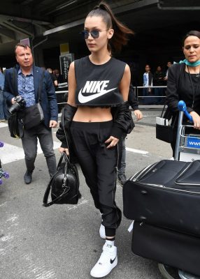 Bella Hadid stayed true to her casual chic style in a Nike crop top and sneakers.