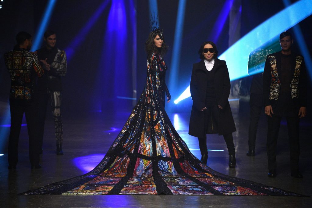 Michael Cinco takes a bow after the preview of his collection during season 6 of Dubai's Fashion Forward.
