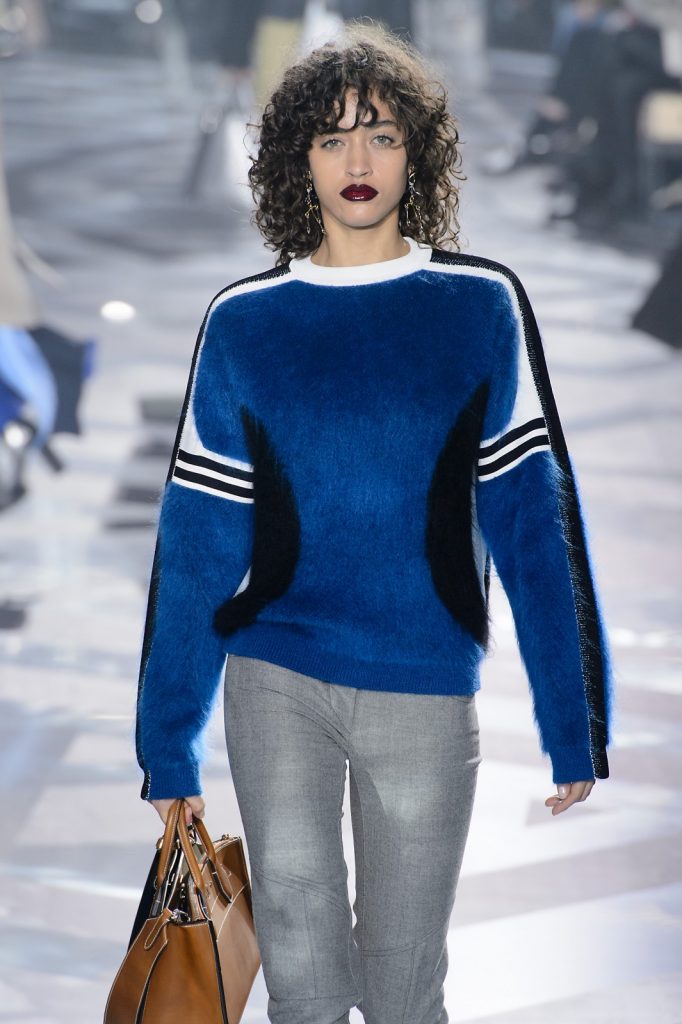 Louis Vuitton’s a/w16 show incorporated elements of activewear in their series of colour-blocked stretchy knit shirts with sporty stripes