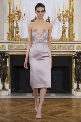 Simple Persian lilac dresses are elevated with plunging necklines and delicate, yet sparse, beadwork