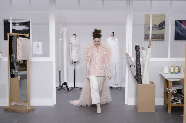 The most highly-anticipated look in any collection is usually the wedding gown, which closes the show. This year’s Chanel bride, British model Edie Campbell, closed the label’s Couture runway wearing a pink sequin coat with a fluffy collar and pink camellias woven into her hair.
