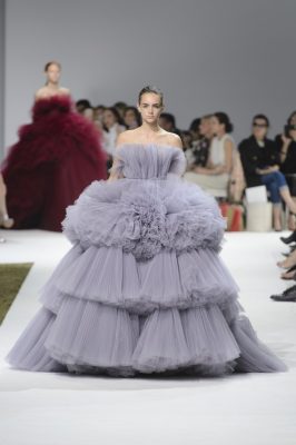 Who: Giambattista Valli  The Dress: Throngs of tulle in white, lavender and mauve thundered down the runway as we laid eyes upon the Italian designer’s signature dresses.