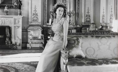 Queen Elizabeth II standing in the White Drawing Room, Buckingham Palace. Official portrait by Cecil Beaton, 1968. Royal Collection Trust / © Her Majesty Queen Elizabeth II 2016.