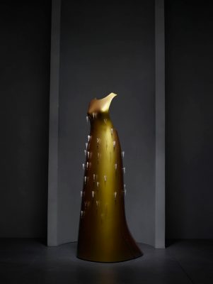Hussein Chalayan’s special museum piece called ‘Floating Dress’ was created in 2011 in collaboration with Swarovski. This gold spray painted shell, which the model steps into, is quite incredible. © The Metropolitan Museum of Art/Nicholas Alan Cope
