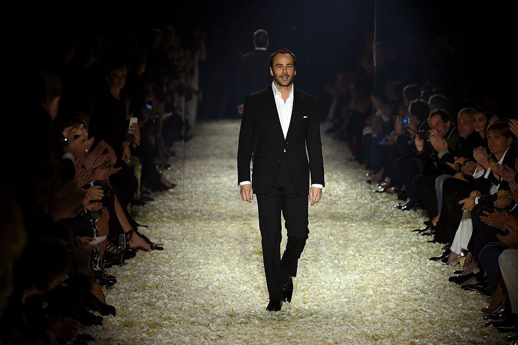 Tom Ford walks the rosepetal strewn runway at his 2015 Los Angeles show.