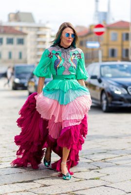 Fashion chameleon Anna Dello Russo wears a tiered Gucci gown.