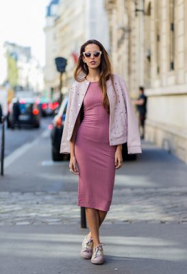 Marta Sierra wears an all pink ensemble as she makes her way between shows.