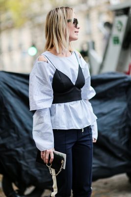 A guest tackles the corset and reverse layering trend on Day Six of PFW.