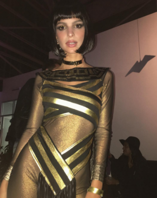 Emily Ratajkowski  The model channelled Cleopatra in a dull gold dress complete with bob wig. Fashion takeaway? A metallic gold choker can update the simplest of ensembles.