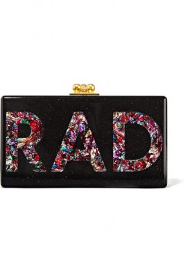 The Fashion-Forward: Edie Parker  Popping a playful punch into the clutch arena, this vintage-inspired clutch has been crafted from hand-poured glittered black acrylic