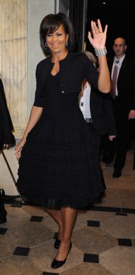 The First Lady in a flattering Azzedine Alaia LBD during a NATO event in Baden-Baden, Germany.