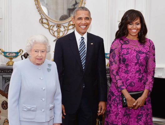 Obama opted for a purple Oscar de la Renta gown for Queen Elizabeth II's 90th birthday, worn with a black clutch and heels.