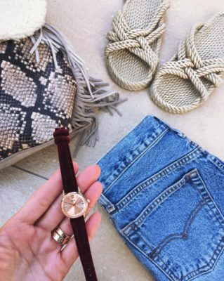 Follow Mirsaleh's lead and don casual denim, nautical slides and a snakeskin clutch for poolside bliss. Image courtesy of @negin_mirsaleh