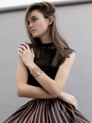 Pink gold paved with diamonds large Serpent Bohème ring, pink gold paved with diamonds Quatre cuff and pink gold Ava Ma Jolie jewellery watch set with diamonds, white mother-of-pearl with four diamond indexes and a jewellery bracelet, BOUCHERON | skirt and dress, VALENTINO