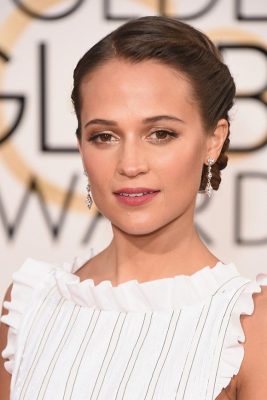 Alicia Vikander. When you’re preparing for global success and need a beauty look to match, you go to Charlotte Tilbury, the makeup artist to the stars who concocted a dreamy yet modern look for the Swedish actress with a combination of her own products including Brow Lift in Cara D, Dreamy Glow Highlighter and Lip Liner in Pink Venus.