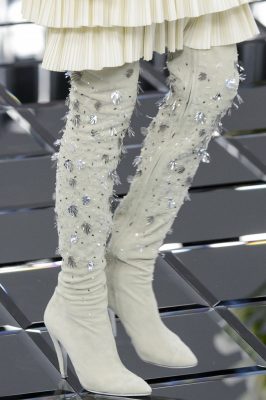 The Summer Boots - Chanel: Soft suede boots became relevant for the season when paired with a light palette and the soft and breezy fabrics of Spring/Summer. Definitive details came in the form of scattered beading and jewels stitched all over to catch the eye and add a sense of glamour