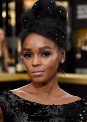 Janelle Monae. For those that believe Janelle Monae’s effervescent glow costs a pretty fortune – it doesn’t. In fact her demure glow was created using Covergirl and drugstore staples by makeup artist Jessica Smalls, who took the au-naturale effect one step further by exfoliating the actress’ lips pre-makeup with lemon juice and sugar