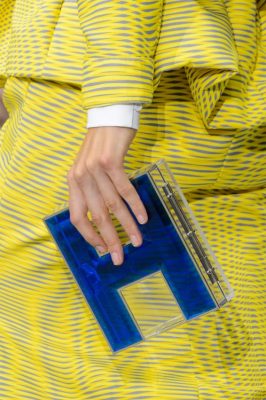 Colourful Clutches: One of the season's biggest trends is bold colour, add a vivid burst with a colour-rich clutch made from unexpected materials like this Mary Katrantzou one.