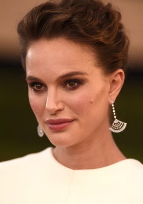 Natalie Portman. Perhaps the only time the words silicone and Hollywood are used in the same sentence to positive reviews is in the instance of the MakeupDrop. This unique silicone-based makeup applicator doesn’t absorb any make-up, which allows for a cleaner, fuller application. Natalie Portman’s makeup artist, Pati Dubroff, used the tool to create the actress’ luminous glow, by mixing two shades of  foundation for luminescence. The actress’ hair was also swept and pinned back in a demure up do.