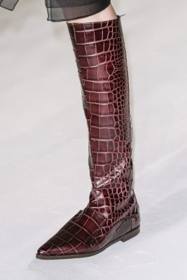 Riding Rules: The riding boot got an opulent makeover at Jasper Conran appearing on the runway in rich oxblood crocodile skin.