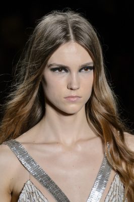 Julien Macdonald's models took to the runway sporting silky tresses with gentle waves