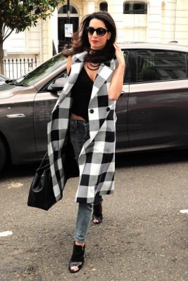 When: June 23, 2015 | Black and white makes a comeback with this sleeveless coat, worn over Citizens of Humanity jeans and with Heidi London sunglasses and a Dior handbag.