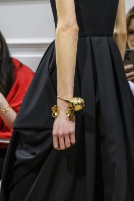 Bold Baubles: J.W. Anderson chose to accessorise his runway looks with statement gold cuffs and bangles.