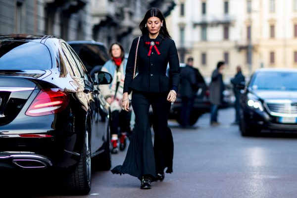 Flared Focus: Giovanna Battaglia styles her statement flares with a structured jacket. Pleat details on the trousers bring extra movement and lightness to the silhouette.