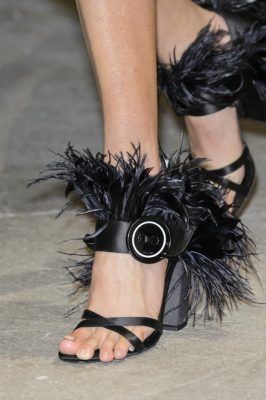 Block heeled mules were brought to life with theatrical feather details
