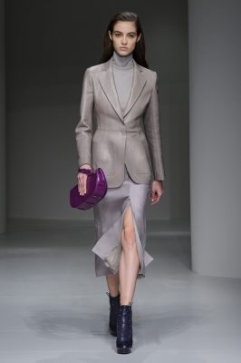 Salvatore Ferragamo:Fulvio Rigoni presented his second collection this week, which he described as “dynamic, sensual, luxe, comfortable.” Silk skirts, fitted polonecks and platform-soled jet-black booties were elevated with bold-coloured crocodile clutches and patent jackets cinched in at the waist.
