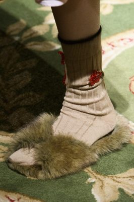 Socks and Slippers: At Simone Rocha super soft fur slides were paired with skin toned socks for an elegant vintage vibe.