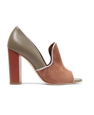 The pump: The silver trim on these suede and leather pumps by Malone Souliers will take them easily from day to night.