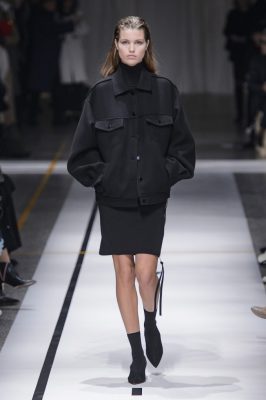 Sportmax: Jet-black ankle booties were worn with short, tight-fitting skirts that were paired with modest, figure-hugging necklines. Kate Bush’s Running Up That Hill was chosen as the soundtrack for autumn/winter17, and suited the brand’s athletic theme – a no brainer for the Italian sportswear brand. Navy, white and black were injected with bright flashes of orange.