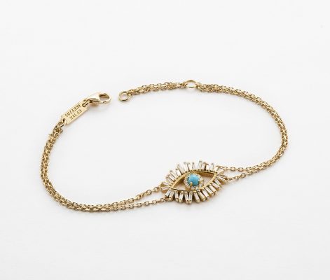 Evil Eye Bracelet, SUZANNE KALAN. The designer’s latest release, the Evil Eye Fireworks Collection features scattered settings and baguette-cut diamonds, which serve as spider-spindly eyelashes that encompass an iris of turquoise stone.