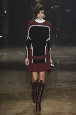 Versus Versace: Athleisure reigned supreme at Versus where sports-style collegiate silhouettes in  black, maroon and navy stormed down the runway.