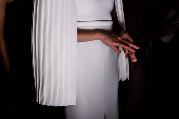 Brandon Maxwell: A pleated cape was used to soften a sharply tailored all-white ensemble at Brandon Maxwell
