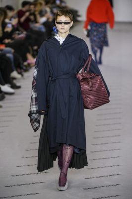 Balenciaga: 'Modern sophistication' was the catchphrase at Balenciaga where Demna Gvasalia took inspiration from Cristóbal Balenciaga's old lookbooks. What materialised was a collection peppered with oversized coats fastened on the shoulder and sleek pencil skirts paired with coloured stocking boots and oversized totes.