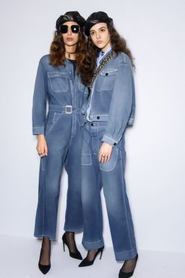 Heavy duty, washed out denim jackets and jumpsuits created a utilitarian vibe which was softened with white contrasting stitching on hems and pockets, cinched waists and black suede heels.