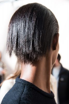Chloe: Give Chloe's short hair a slick back a go by brushing freshly washed, dry hair close to the scalp with a comb. Spread a water-based hair gel over fingers and smooth over hair before combing again. Spray lightly with a hair spray and blow dry briefly to set the look.