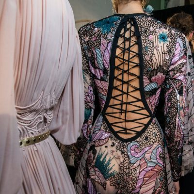 Elie Saab took a majestic turn with dark ethereal gowns and detailed delicate lace that was blended into floral-shaped velvets. Corset backs were bordered with thick black ribbon, while soft tulle and chiffon fabrics gave off a romanticised mood.