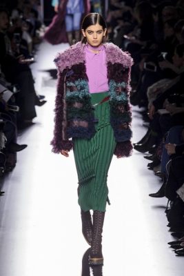 Hermès. The attitude of the Hermès woman displayed a significant shift towards upbeat pop culture while staying true to its sense of timeless elegance. Here capes, coats and high-waisted trousers were dipped in lavender, emerald and peony pink to create pieces that empowered the modern woman