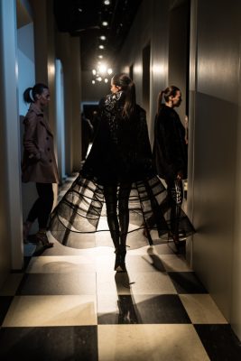 Oscar de la Renta: Sheer mesh trains paired with leather trousers and parkas felt both modern and theatrical.
