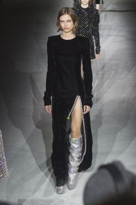 A sheath dress dazzles when accented by diamanté encrusted boots.