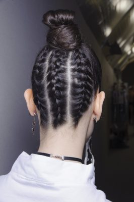 Christian Dior | Guido Palau reveals that the turn-of-the-century skater girl provided inspiration for Dior’s spring/summer17 plaited buns in the runway’s show notes. A friend/assistant is undoubtedly needed to achieve this ‘do, which is offset with J’Adior earrings.