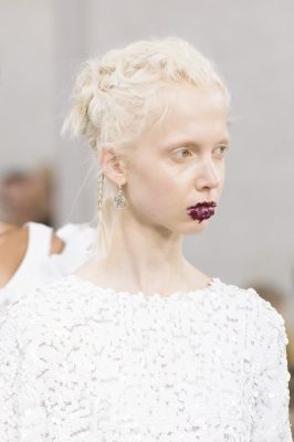 Preen by Thornton Bregazzi | An incredibly striking look for those with a statement hair colour, undone and rough oversized cornrows add incredible life and texture to this updo, while loose curls and tight mini-plaits inject a romantic edge into this theatrical style.